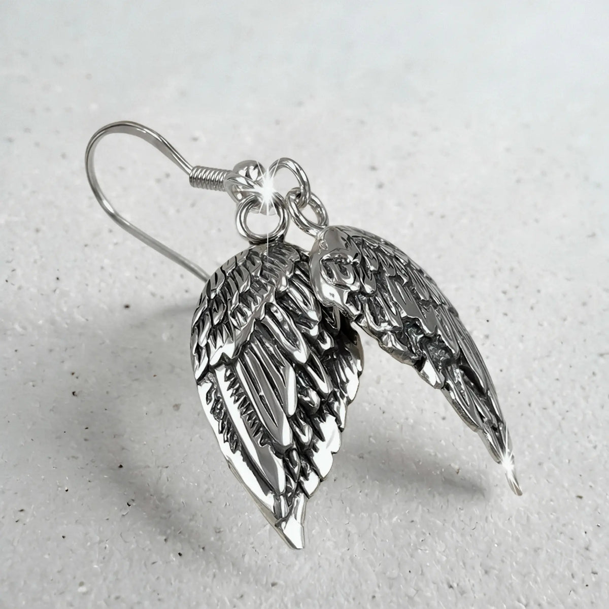 Aros Colgantes Alas de Ángel en Plata 925